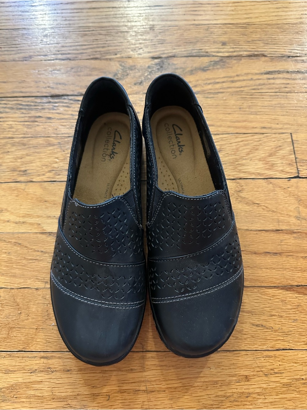 Clarks Black Perforated Slip-On Comfort Flats
